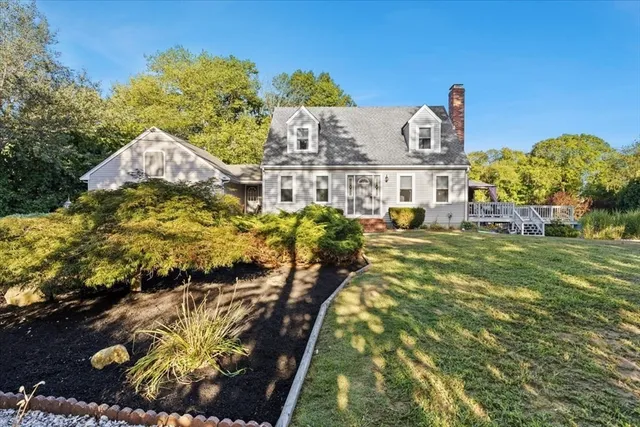 a view of a chairs and table in the balcony