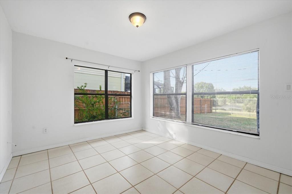 10971 57th Avenue Seminole, FL 33772 - Photo 12 of 26 a view of an empty room with a window