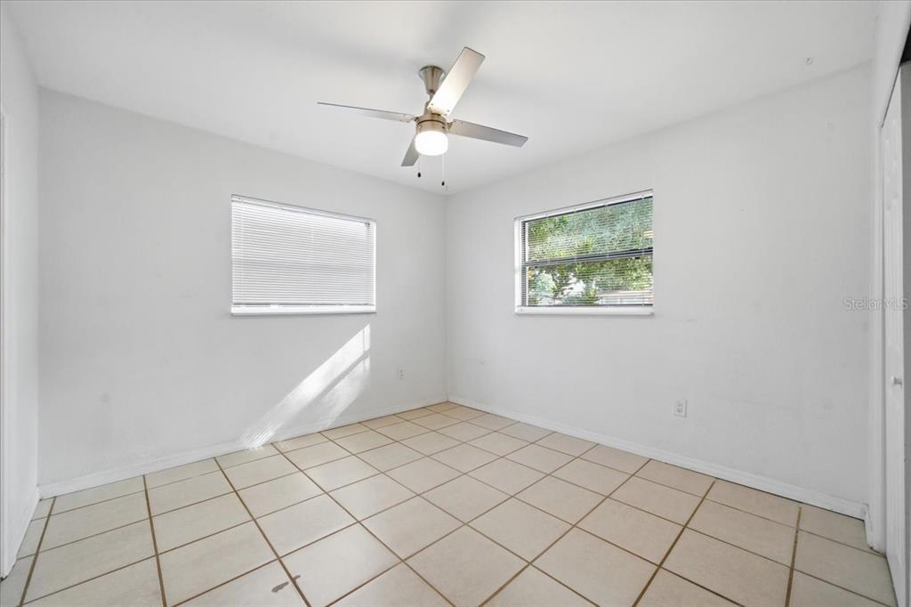 10971 57th Avenue Seminole, FL 33772 - Photo 16 of 26 a view of an empty room with a window