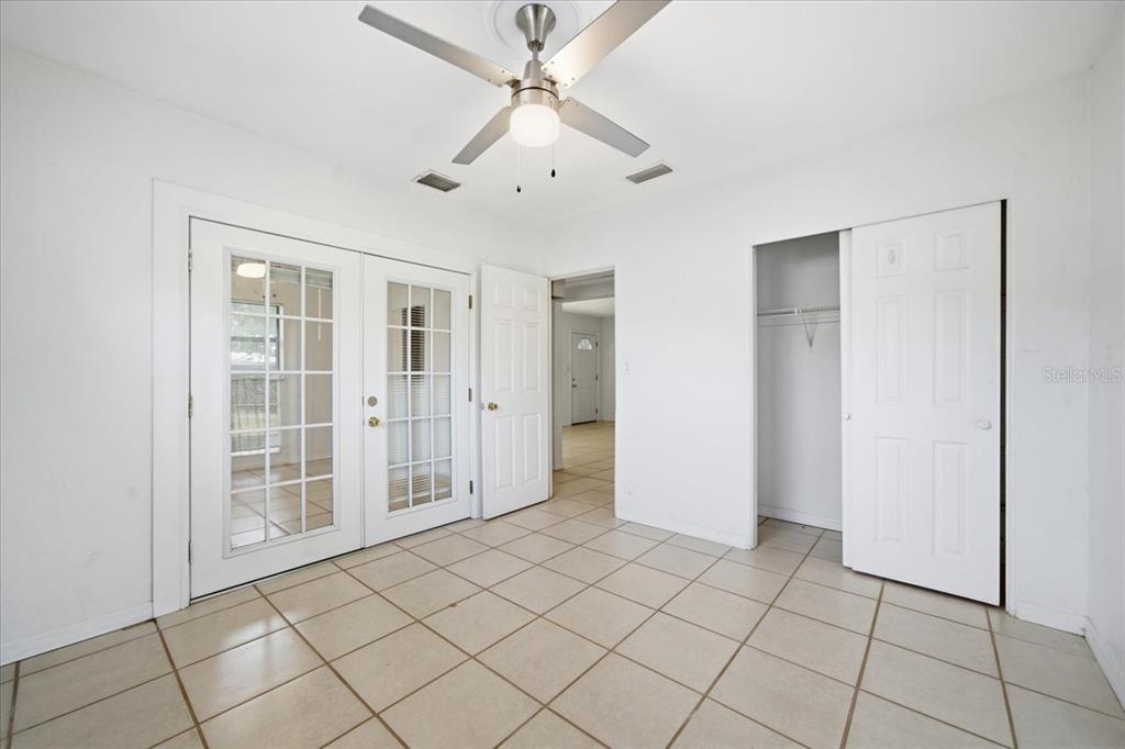 10971 57th Avenue Seminole, FL 33772 - Photo 18 of 26 a view of an empty room with window