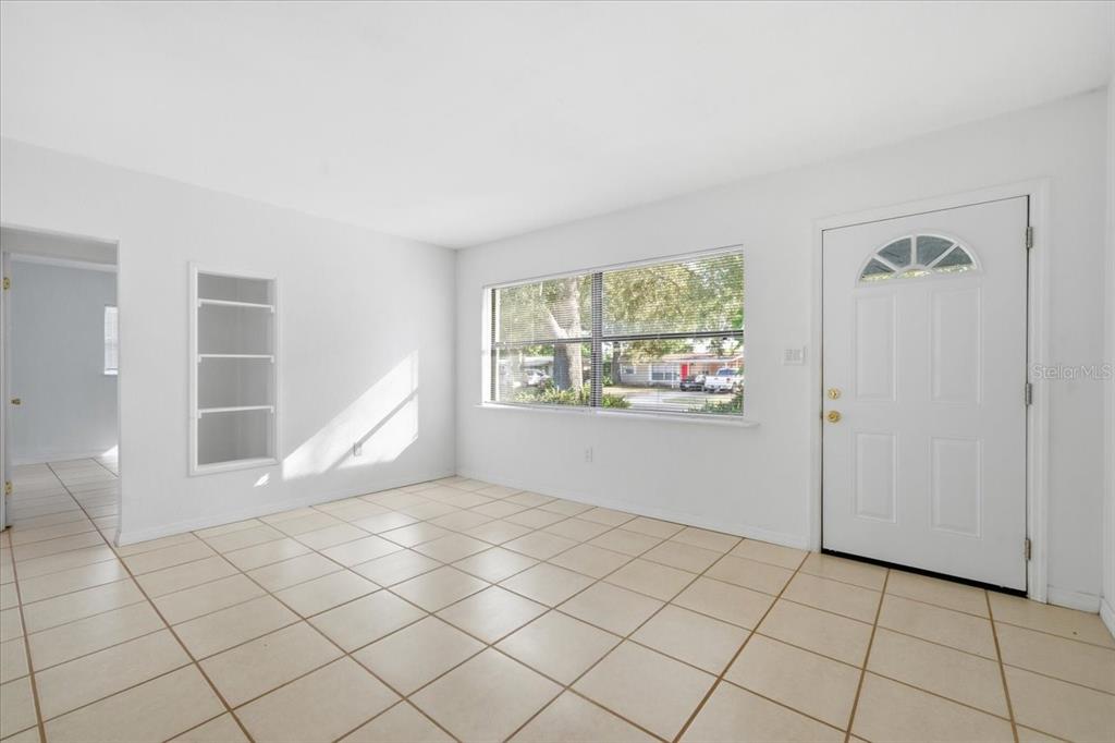 10971 57th Avenue Seminole, FL 33772 - Photo 2 of 26 an empty room with windows and closet
