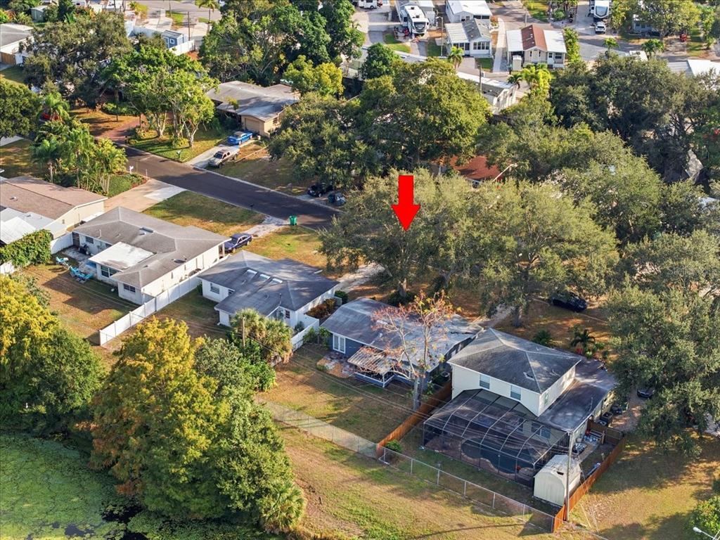 10971 57th Avenue Seminole, FL 33772 - Photo 23 of 26 an aerial view of residential houses with outdoor space