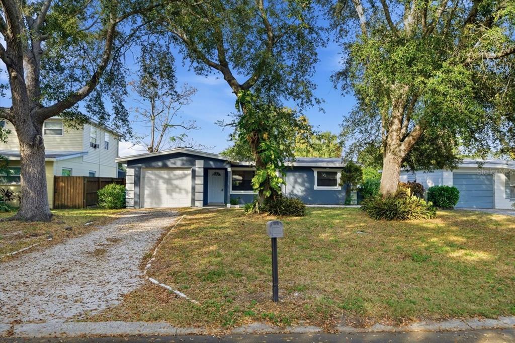 10971 57th Avenue Seminole, FL 33772 - Photo 26 of 26 a front view of a house with a yard