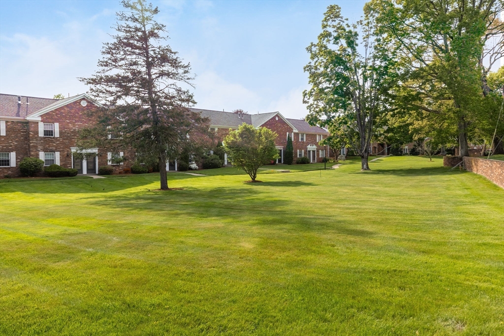 910 Edgell Road, Unit 914A Framingham, MA 01701 - Photo 19 of 22 a view of a field with a trees
