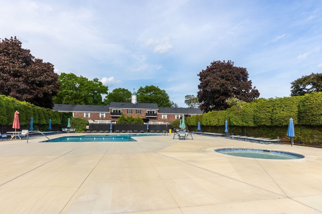 910 Edgell Road, Unit 914A Framingham, MA 01701 - Photo 21 of 22 a view of a playground with basketball court