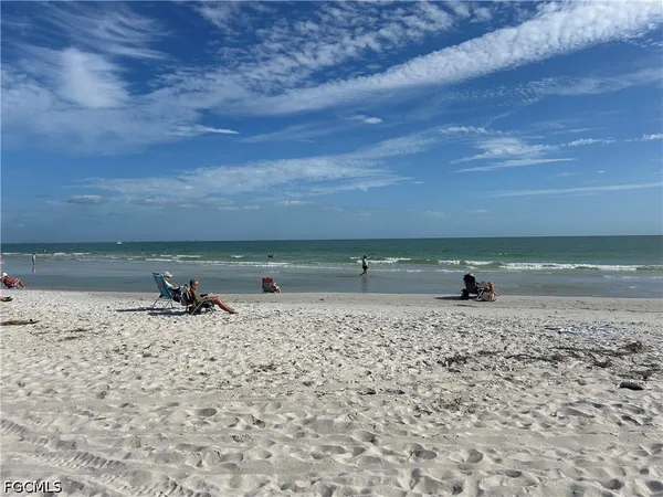 a view of an ocean and a yard