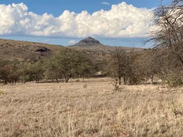 a view of mountain view with mountains in the background