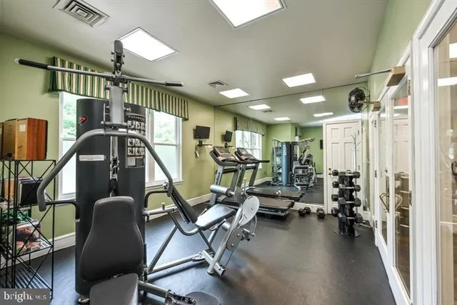 a view of a room with gym equipment