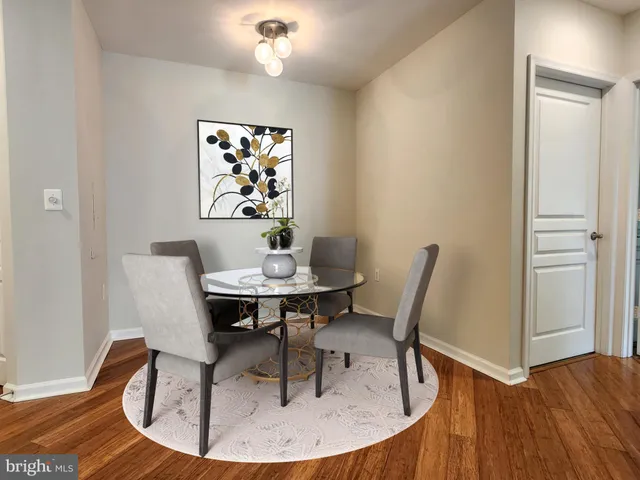 a workspace with furniture and wooden floor