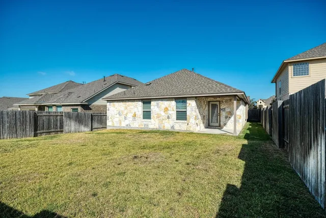 a front view of a house with yard
