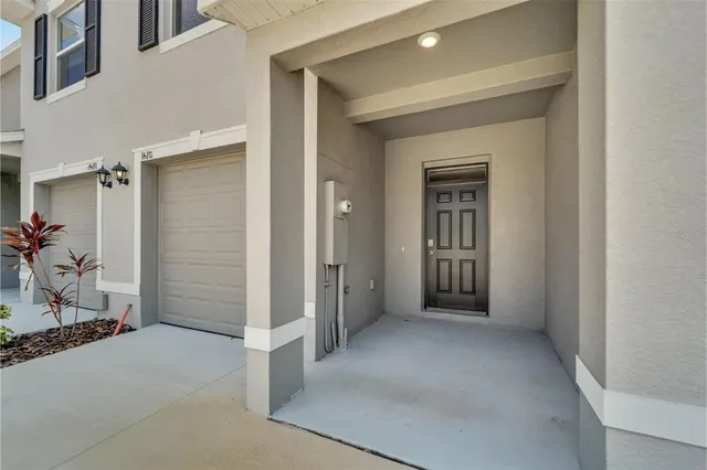 a kitchen with stainless steel appliances granite countertop a refrigerator a stove a sink and a microwave