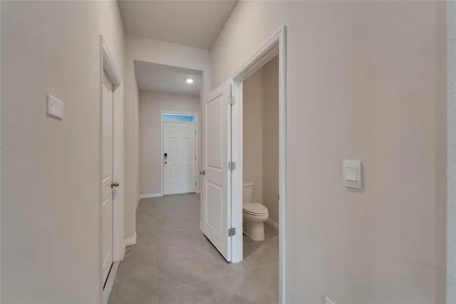 a view of a street with a building in the background