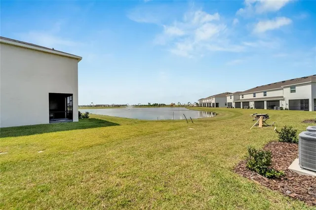 an aerial view of a house with a garden