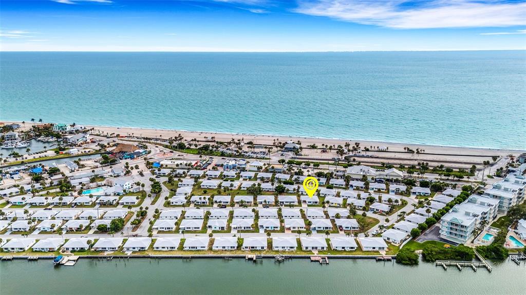 1977 Beach Road, Unit 84 Englewood, FL 34223 - Photo 30 of 42 an aerial view of a houses with a lake view