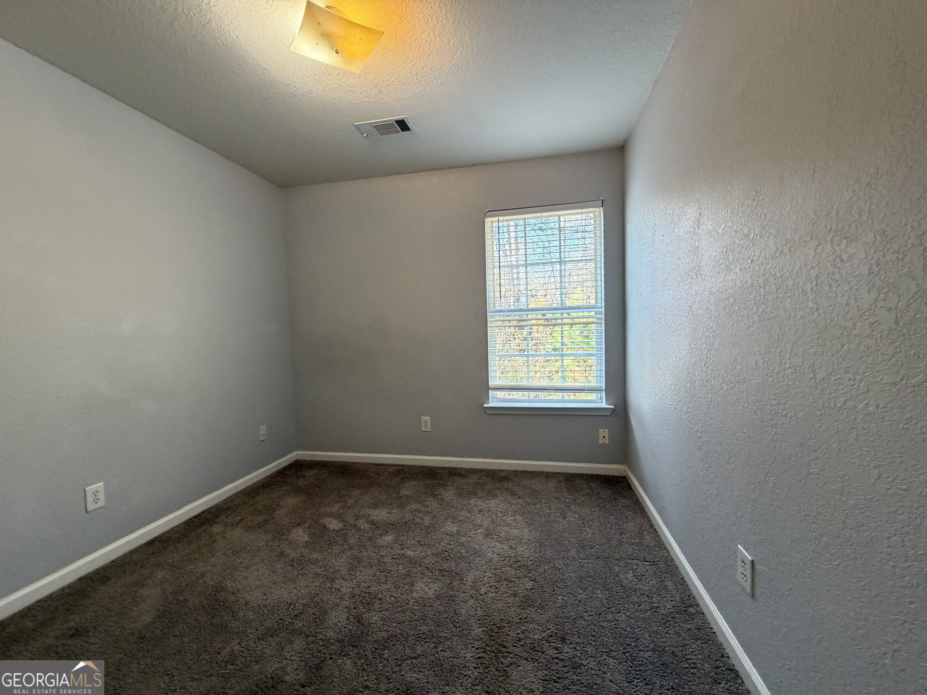 2807 Snapfinger Manor Decatur, GA 30035 - Photo 11 of 17 an empty room with a empty space and windows