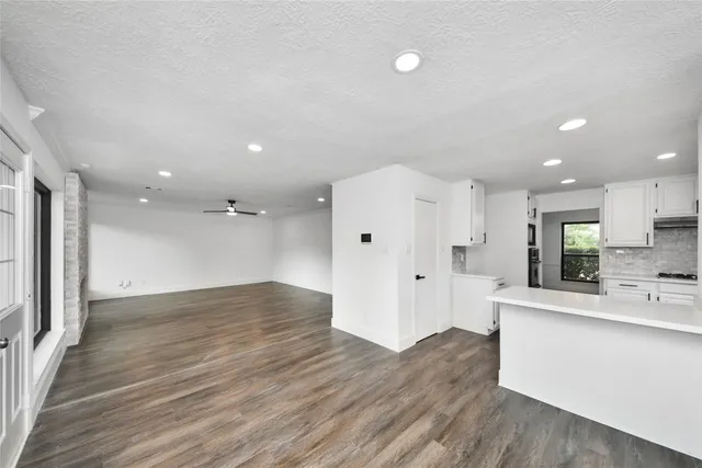a view of kitchen with wooden floor