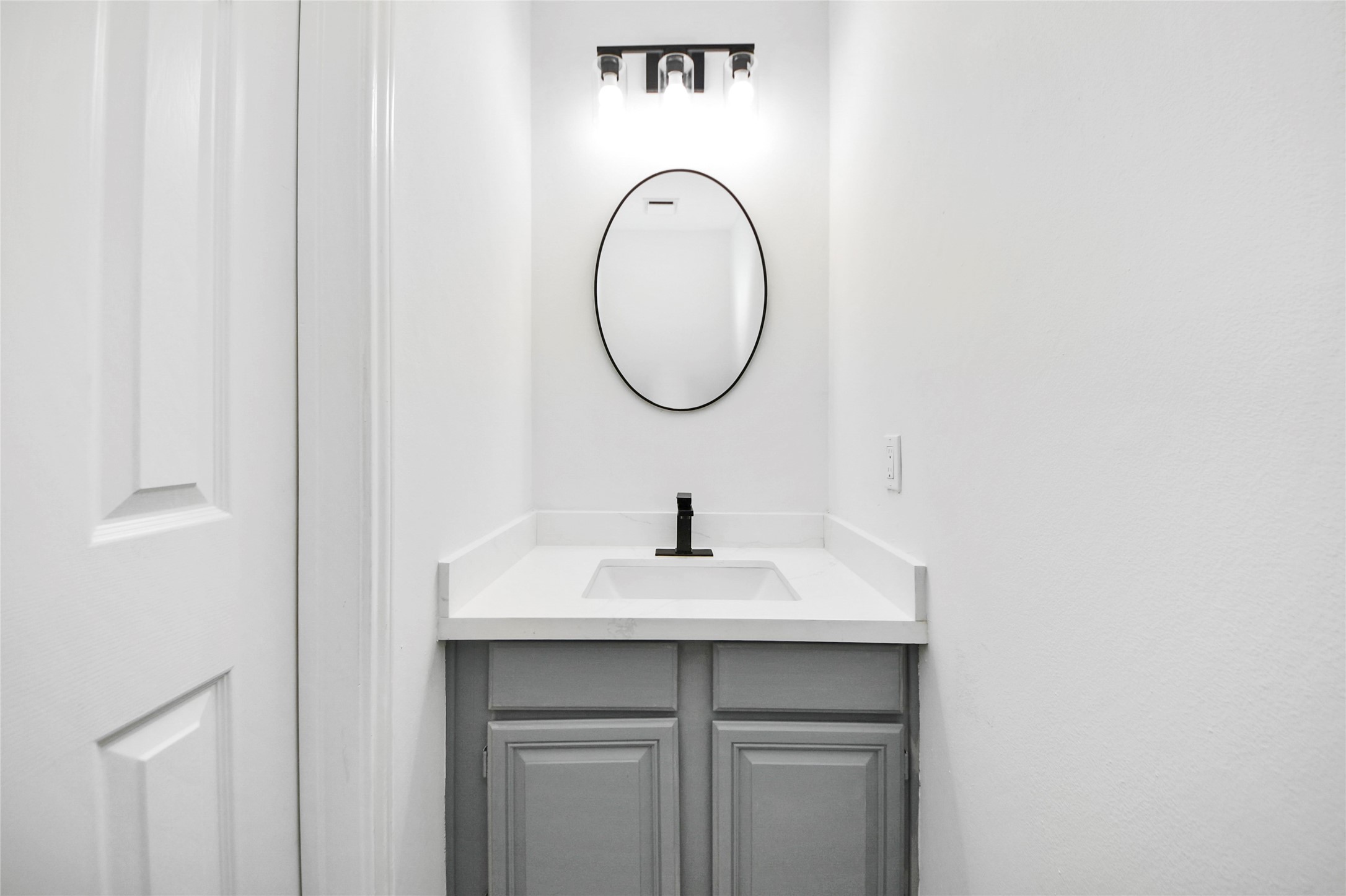 8510 Canyon Pine Drive Spring, TX 77379 - Photo 21 of 42 a bathroom with a sink and a mirror