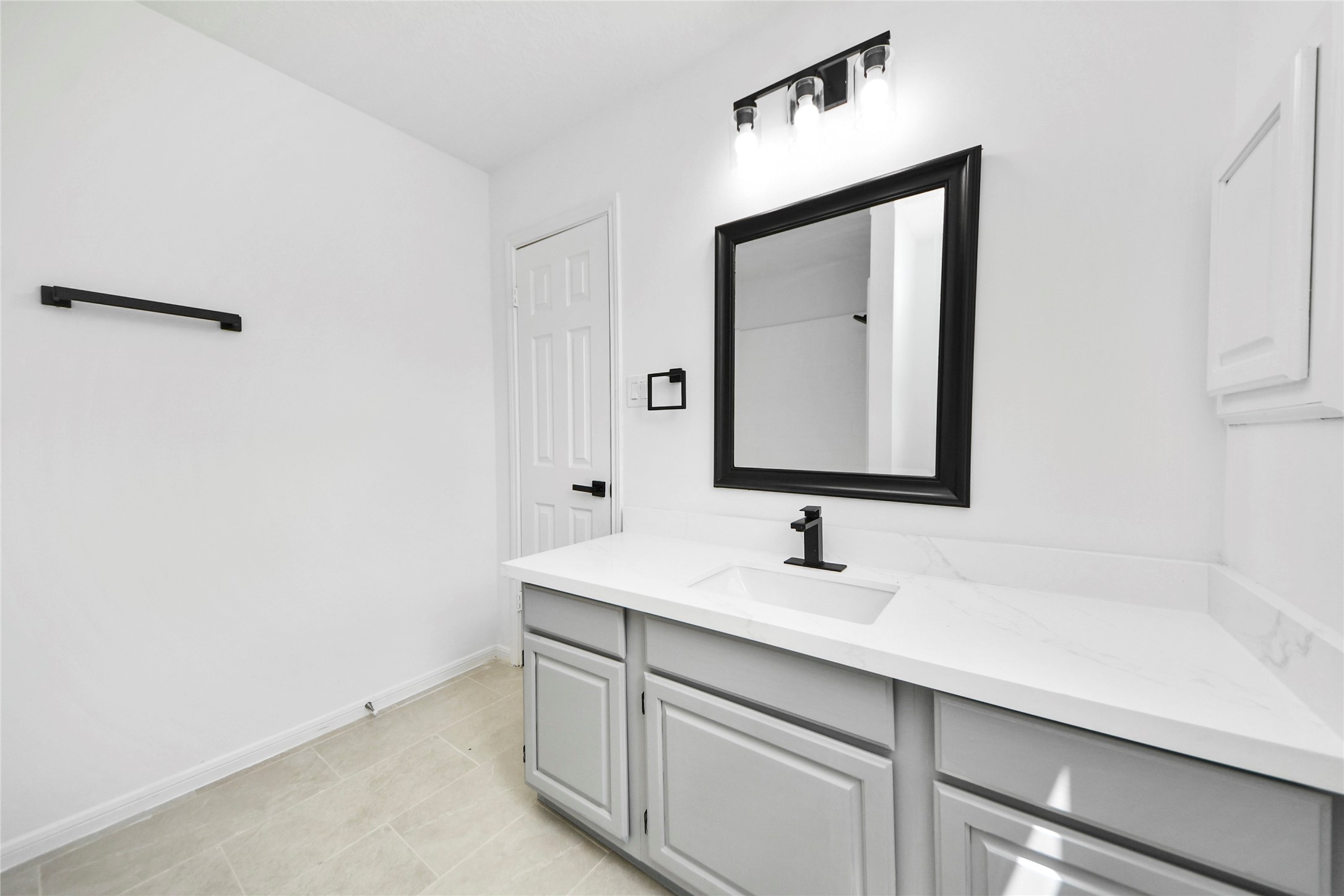 8510 Canyon Pine Drive Spring, TX 77379 - Photo 31 of 42 a bathroom with a sink and a mirror