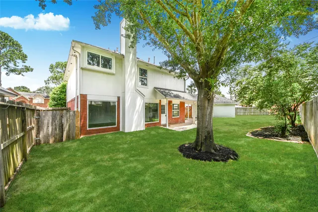a view of a garden with a tree