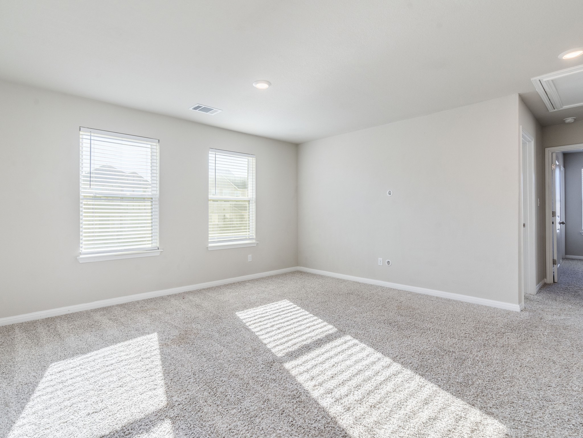 218 Glass Mountain Way Dripping Springs, TX 78620 - Photo 16 of 29 a view of an empty room with a window
