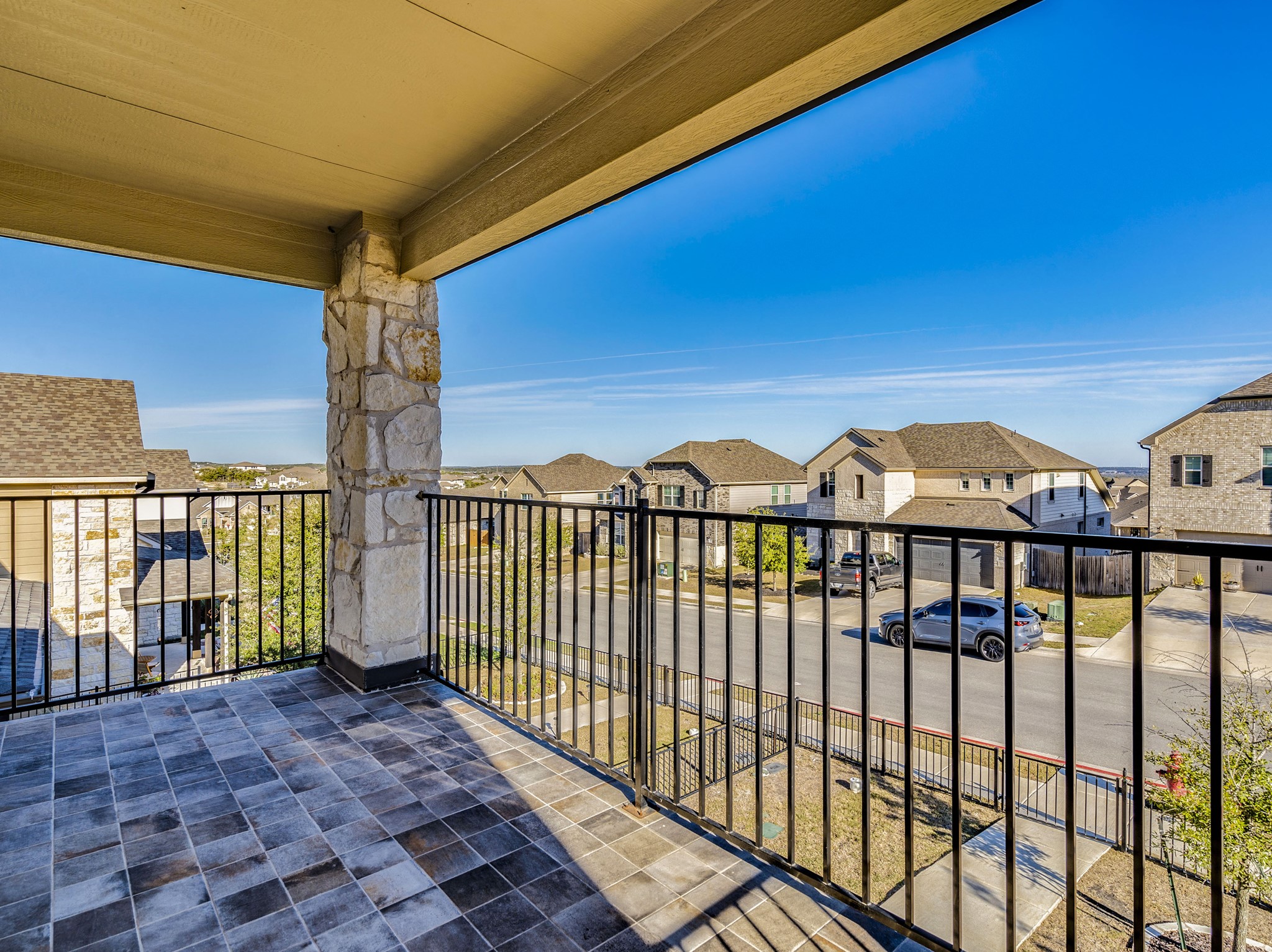 218 Glass Mountain Way Dripping Springs, TX 78620 - Photo 27 of 29 a view of a street from a balcony