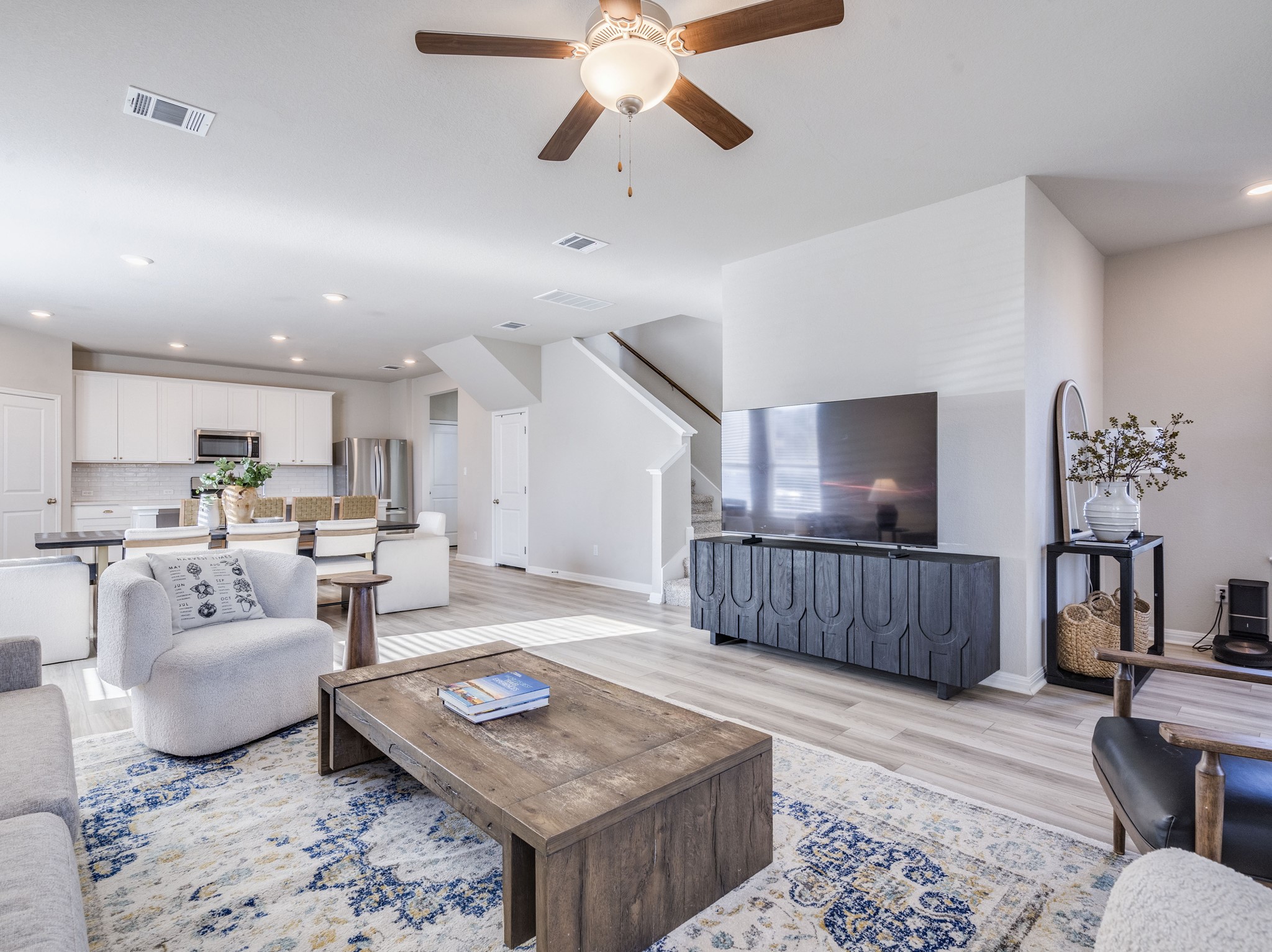218 Glass Mountain Way Dripping Springs, TX 78620 - Photo 3 of 29 a living room with furniture and wooden floor