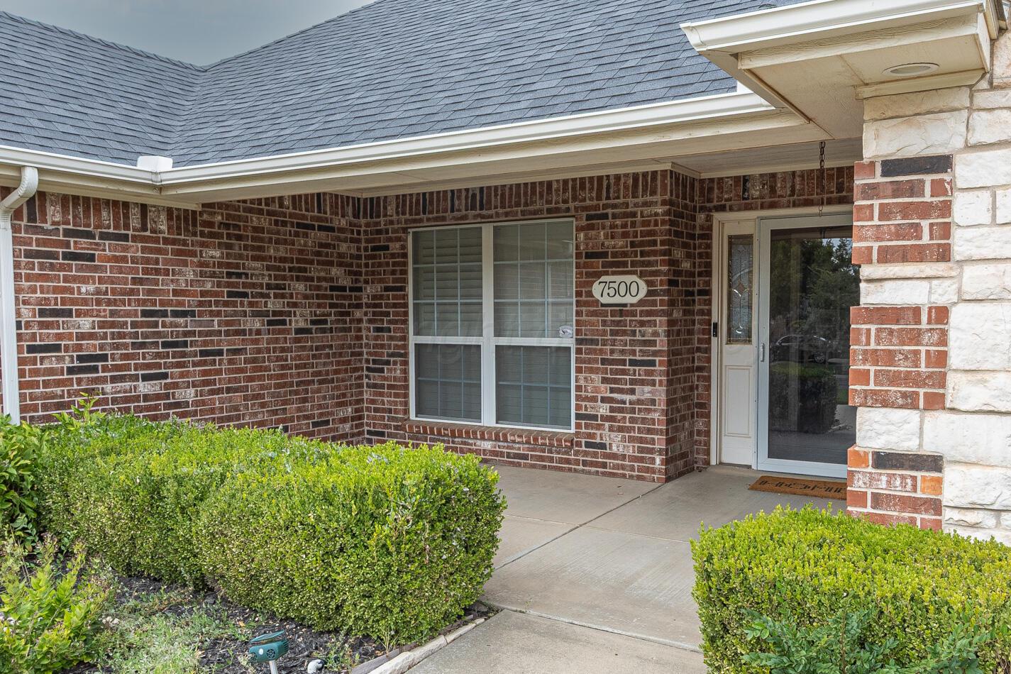 7500 Bayswater Road Amarillo, TX 79119 - Photo 27 of 46 a front view of a house with a large window