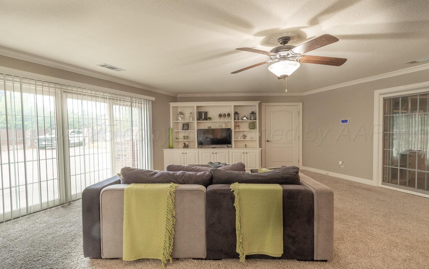 7500 Bayswater Road Amarillo, TX 79119 - Photo 28 of 46 a living room with furniture and a large window