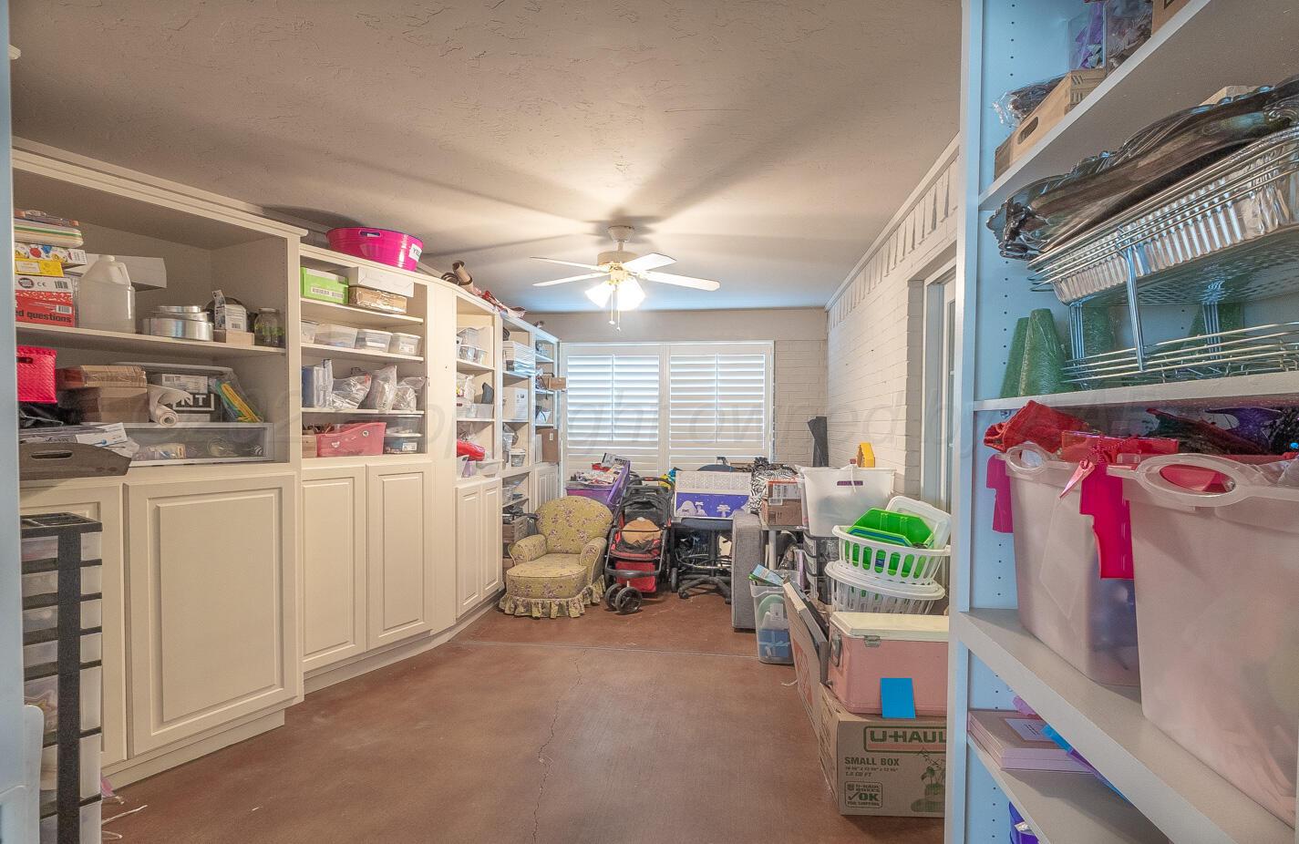 7500 Bayswater Road Amarillo, TX 79119 - Photo 34 of 46 a room with storage and utility