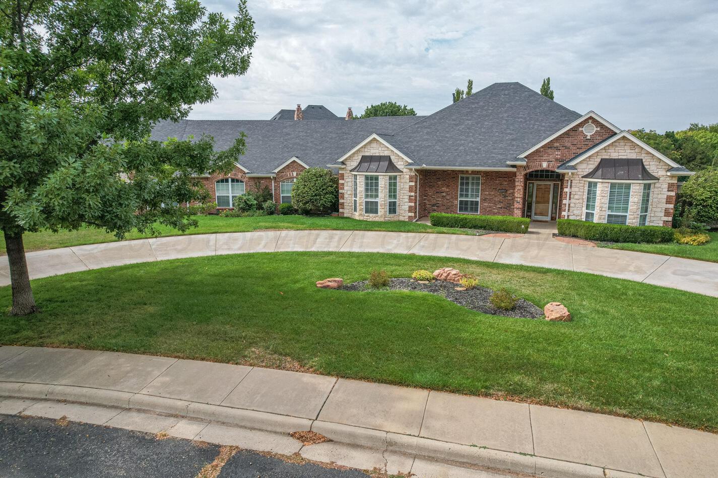 7500 Bayswater Road Amarillo, TX 79119 - Photo 38 of 46 a view of house with garden