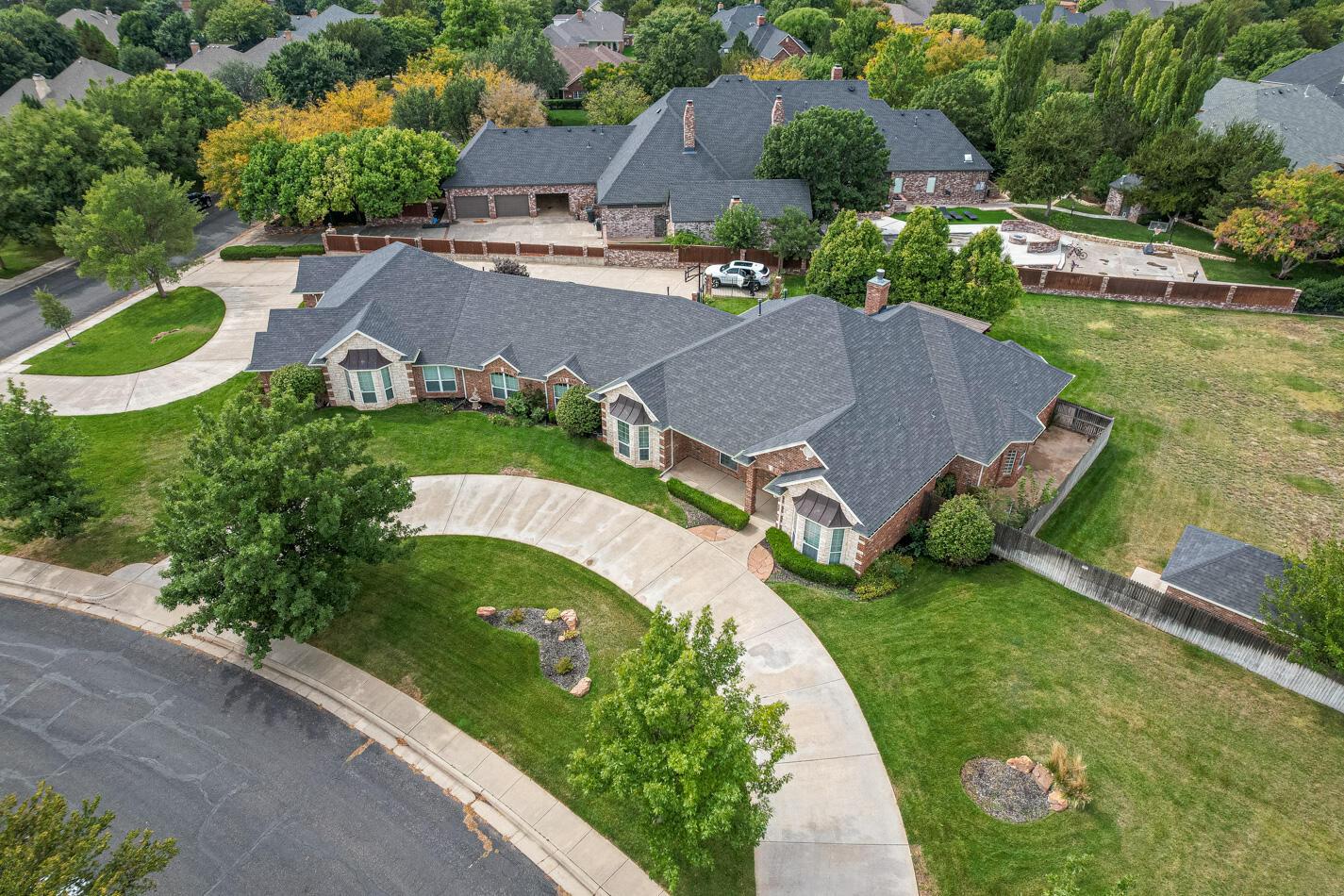 7500 Bayswater Road Amarillo, TX 79119 - Photo 39 of 46 an aerial view of a house with garden space and street view
