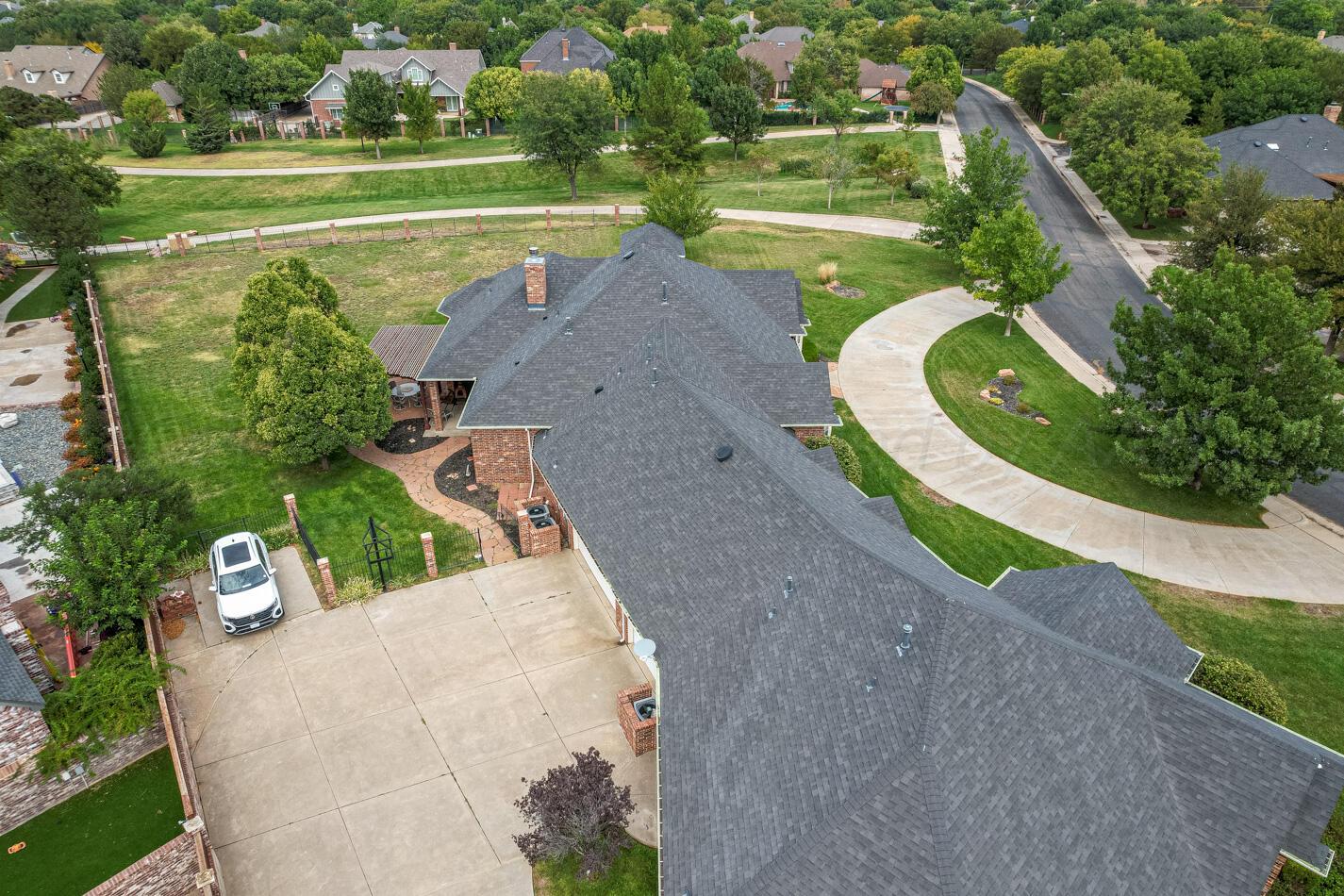 7500 Bayswater Road Amarillo, TX 79119 - Photo 43 of 46 an aerial view of a house with a yard and lake view
