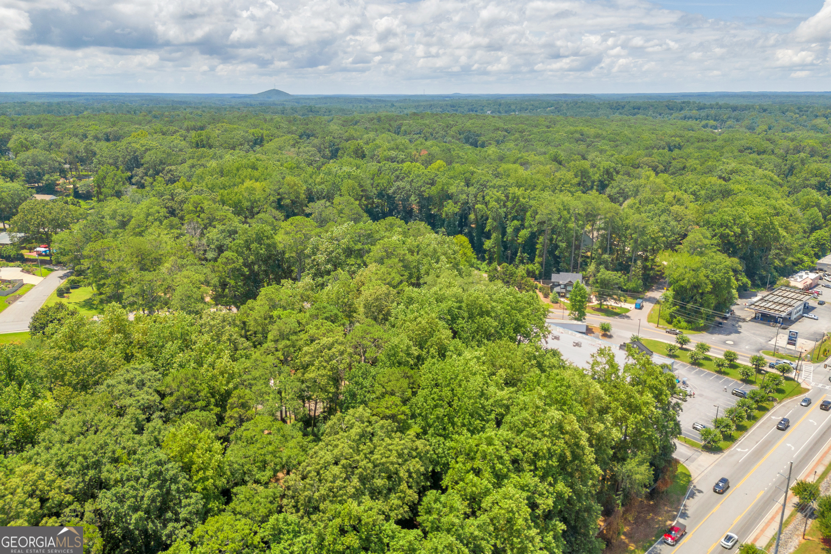 701 West Spring Street Monroe, GA 30655 - Photo 13 of 14 a view of a field with an outdoor space