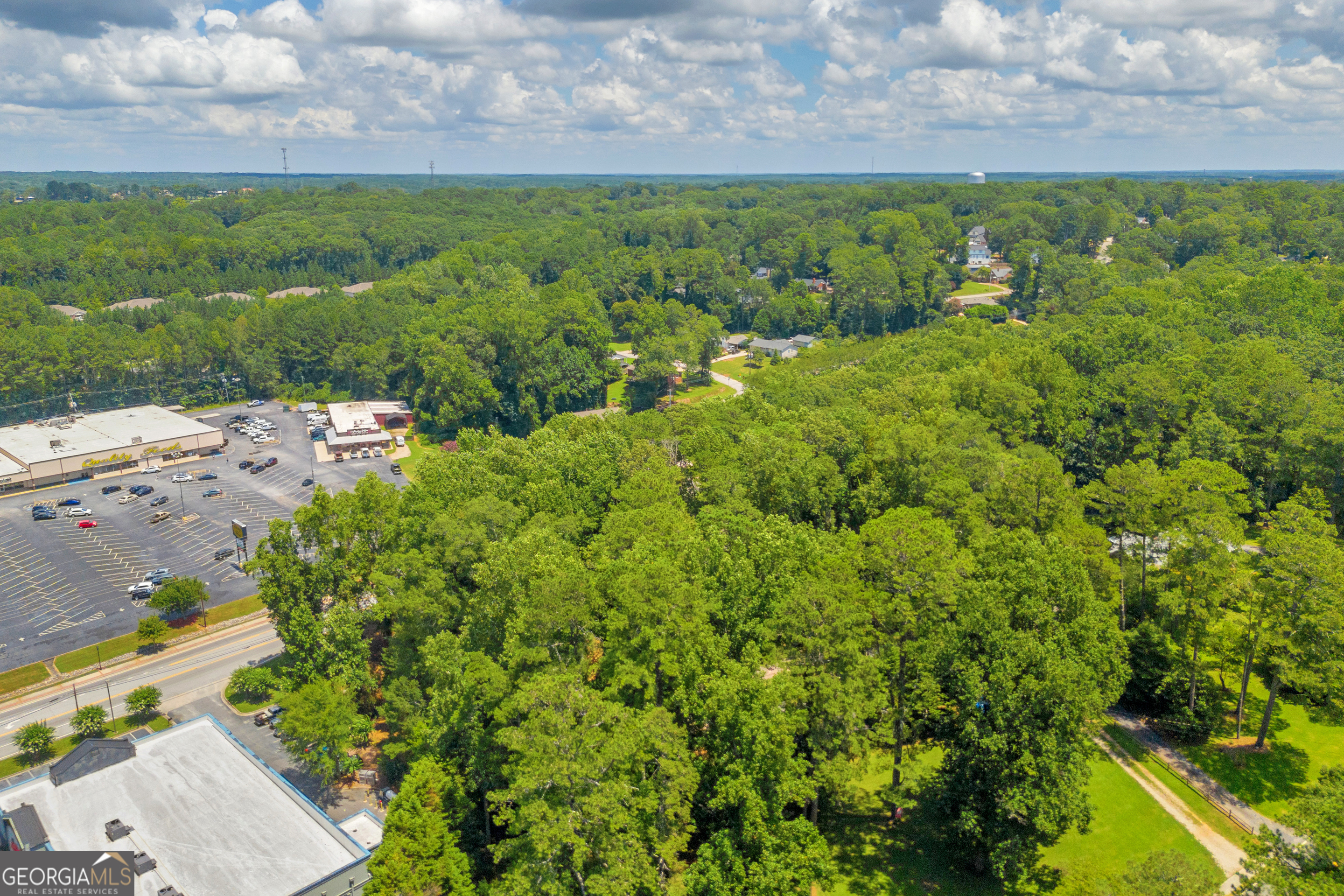 701 West Spring Street Monroe, GA 30655 - Photo 14 of 14 a view of a yard with an outdoor space