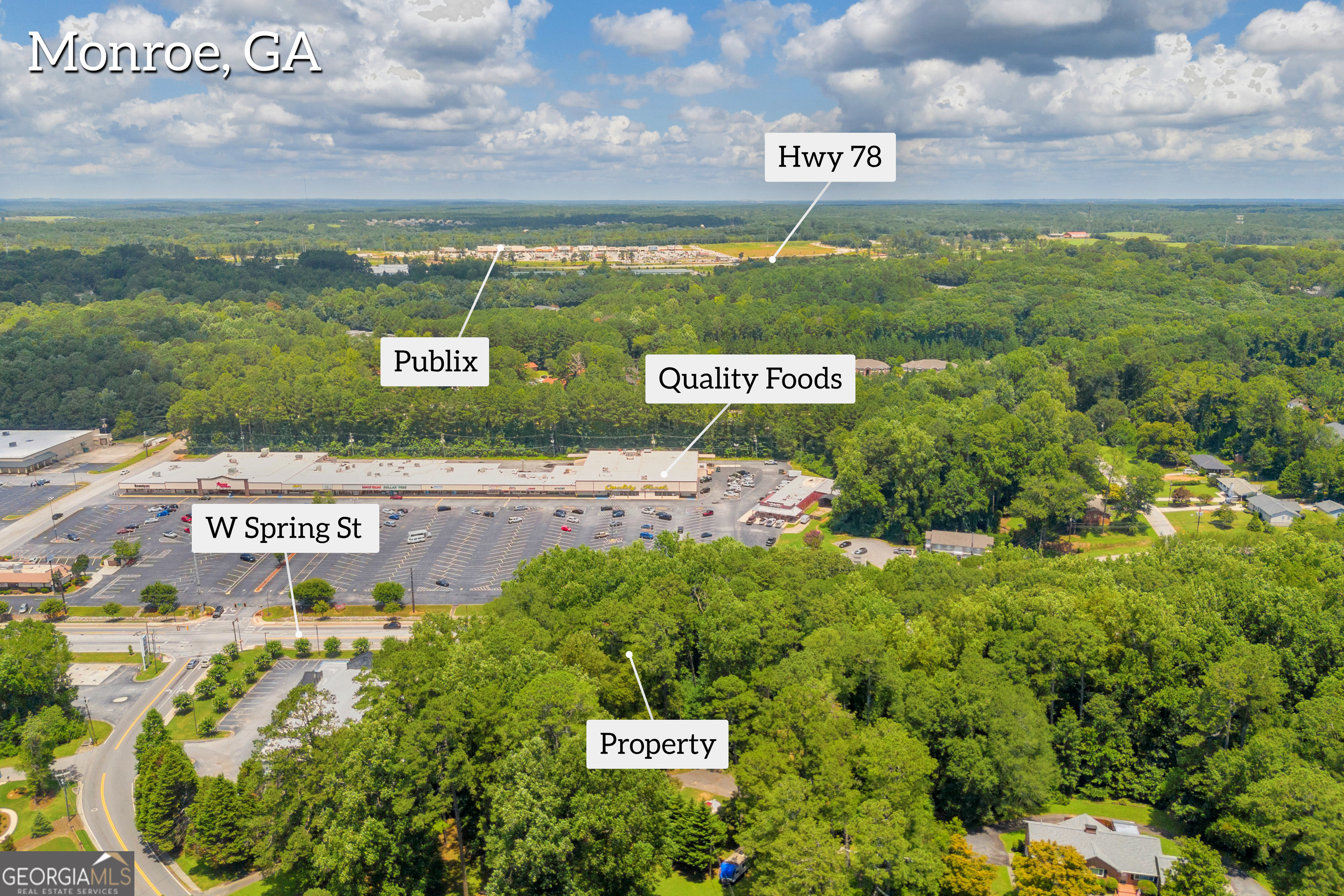 701 West Spring Street Monroe, GA 30655 - Photo 7 of 14 a view of a sign board with ocean view