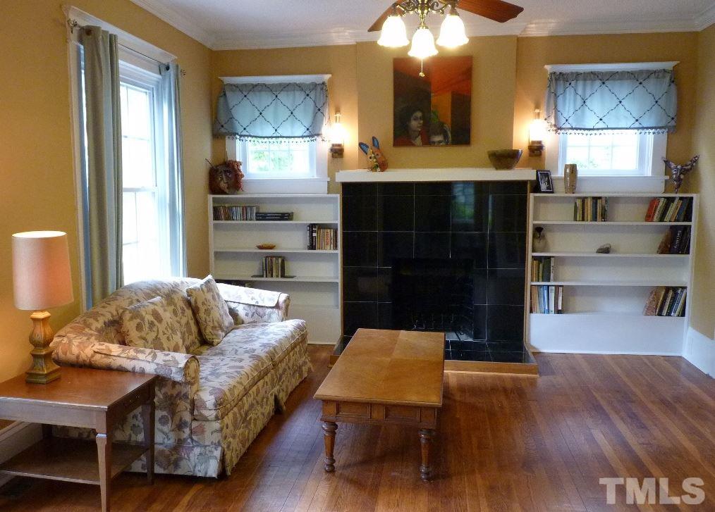 1324 Mordecai Drive Raleigh, NC 27604 - Photo 7 of 22 a living room with furniture and a fireplace