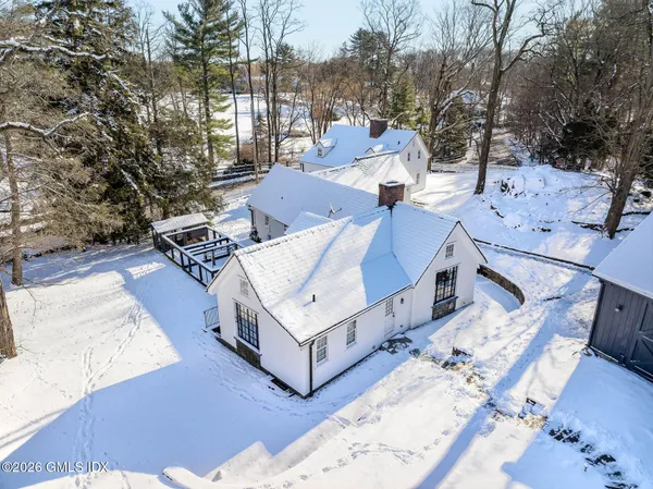 a view of a house with a park