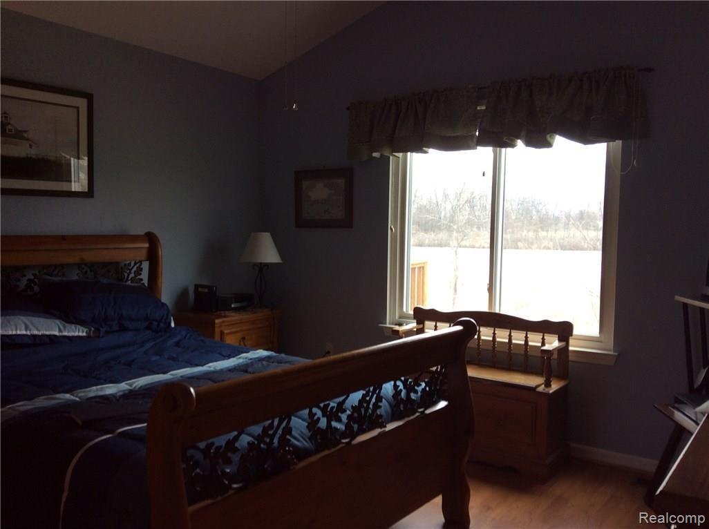 457 Lilly View Court Howell, MI 48843 - Photo 21 of 33 View of lake from master bedroom