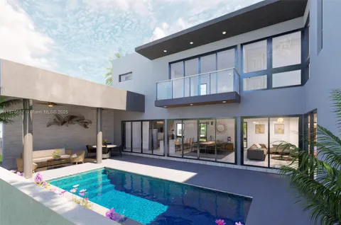 a kitchen with stainless steel appliances granite countertop a refrigerator a sink and a stove