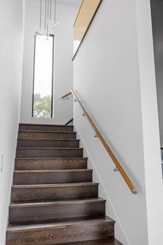 a utility room with sink dryer and washer
