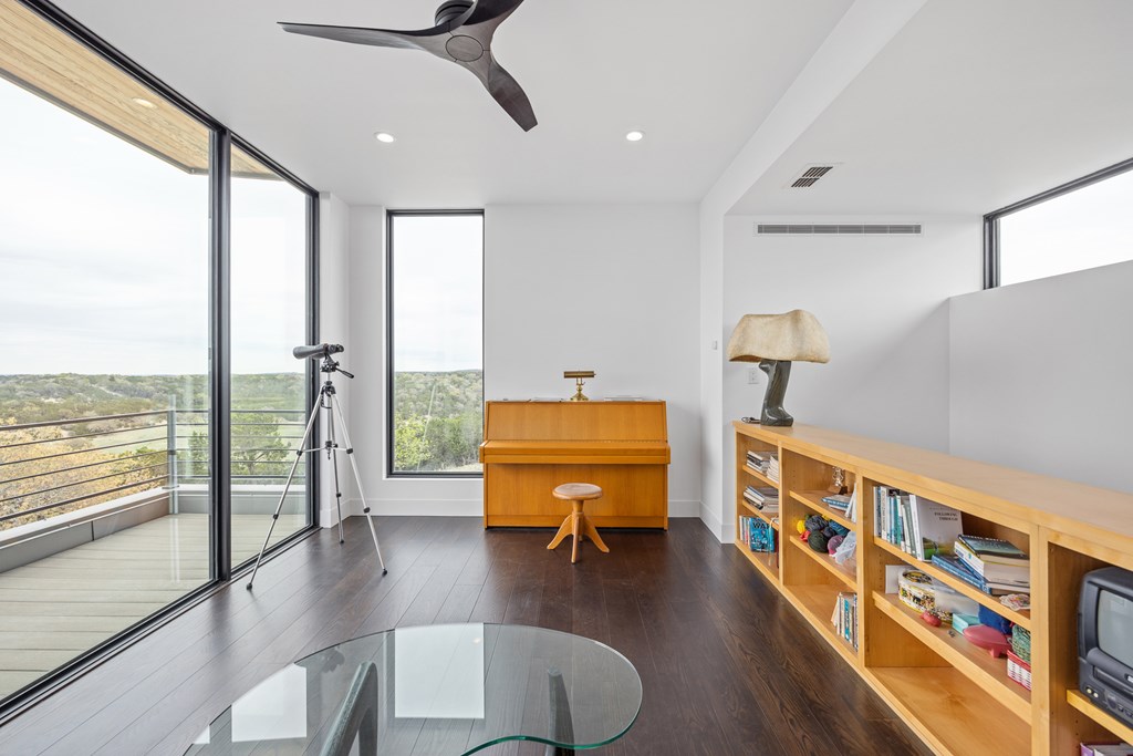 5081 Bandera Highway Center Point, TX 78010 - Photo 25 of 60 a living room with furniture with wooden floor