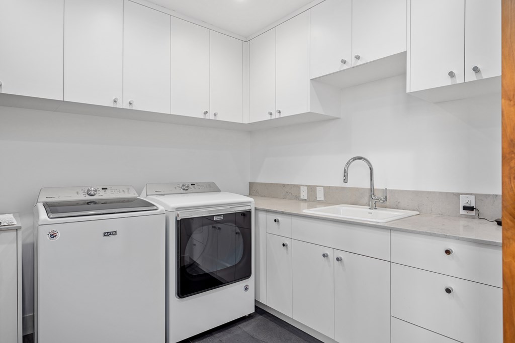 5081 Bandera Highway Center Point, TX 78010 - Photo 26 of 60 a utility room with sink dryer and washer