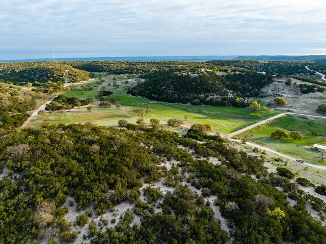 a view of a balcony with lake view and a ocean view