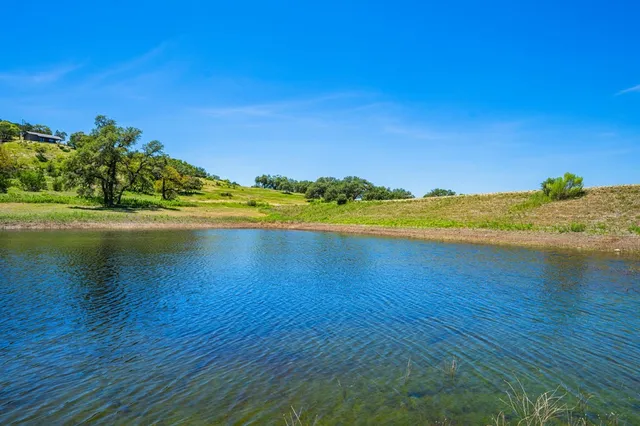 an aerial view of a house with a garden