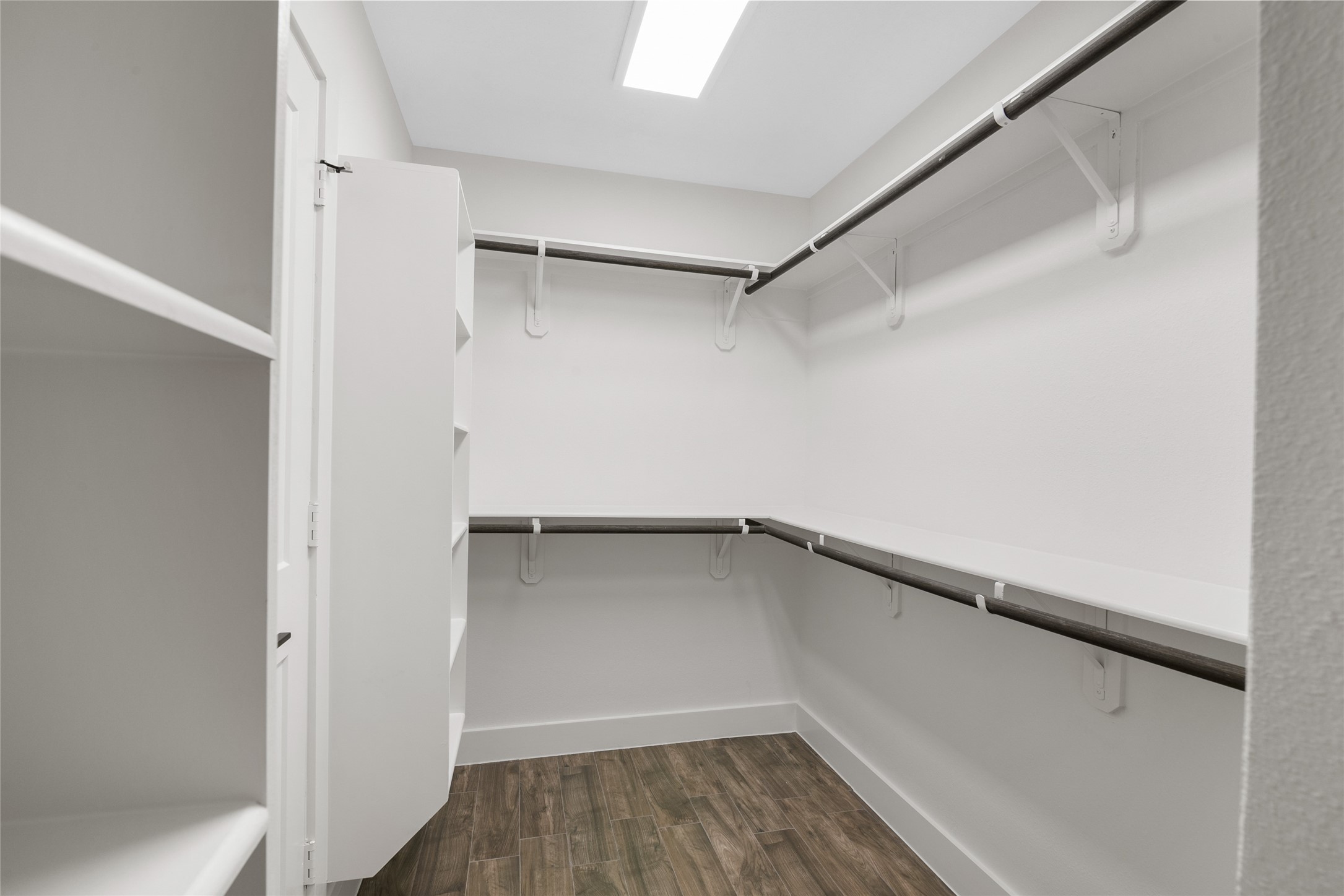 13018 Walden Road, Unit A Montgomery, TX 77356 - Photo 22 of 32 a view of a room with wooden floor