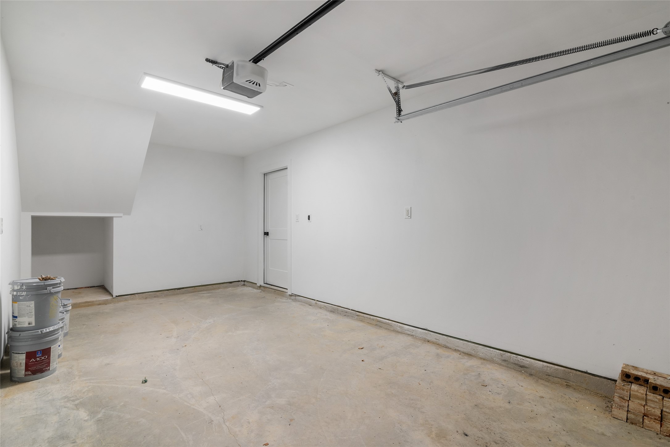 13018 Walden Road, Unit A Montgomery, TX 77356 - Photo 30 of 32 a view of a room with racks on the wall
