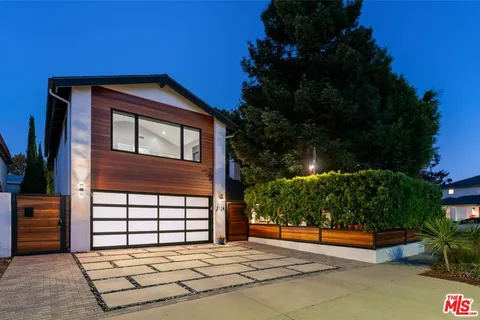 a view of a house with a garage