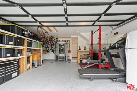 a room with lots of stairs and furniture