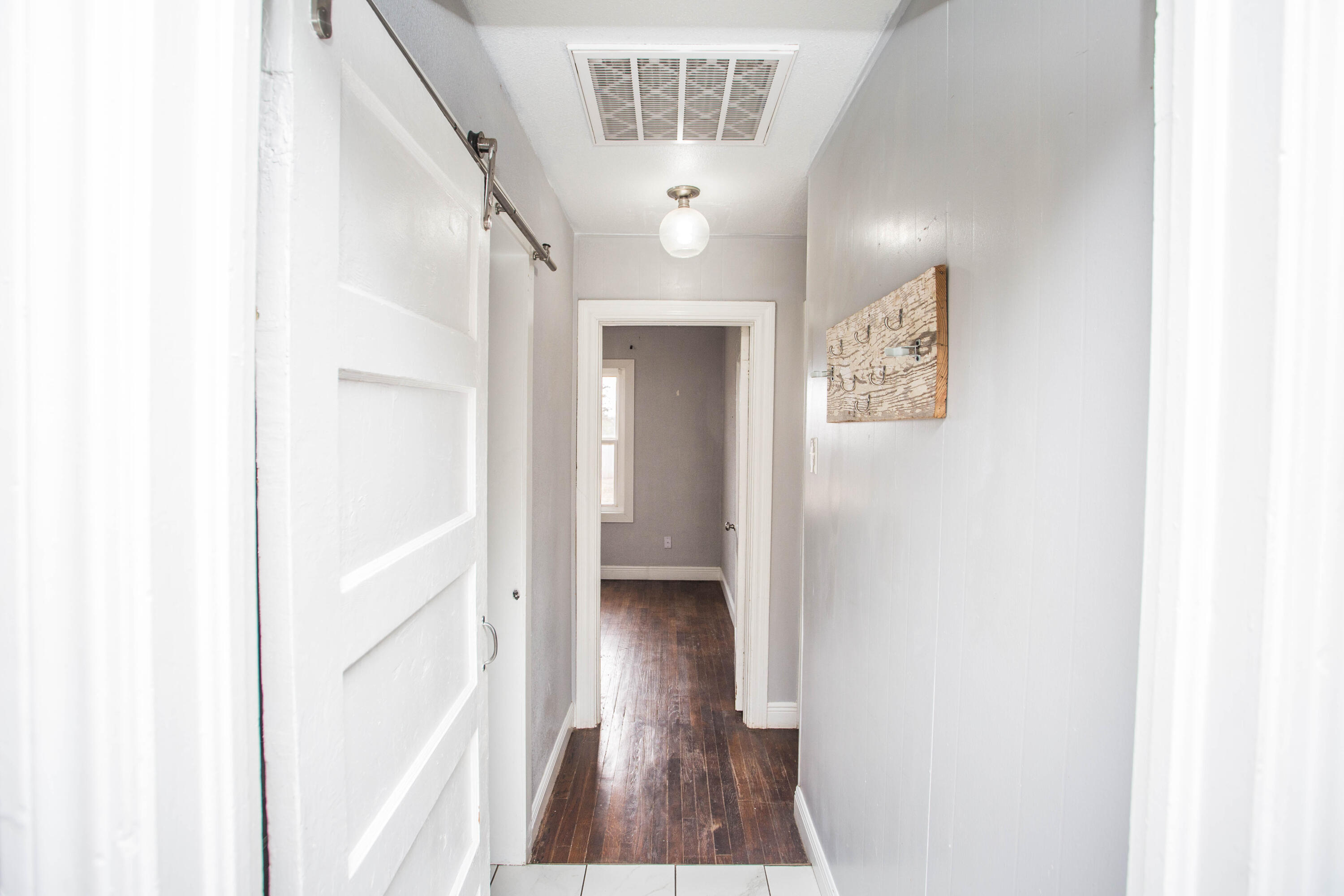2409 39th Street Lubbock, TX 79412 - Photo 7 of 16 a view of a hallway