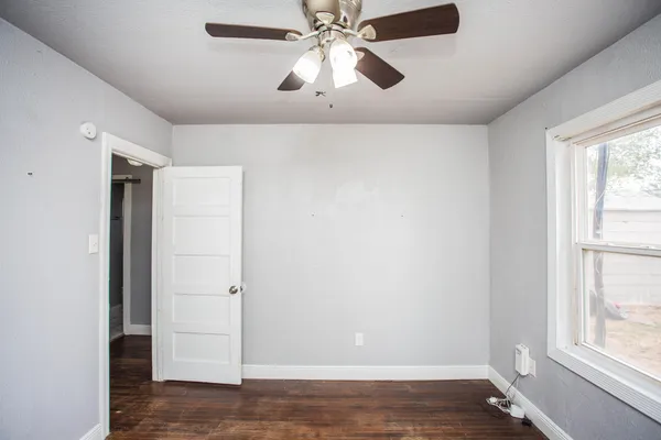 a view of an empty room and window